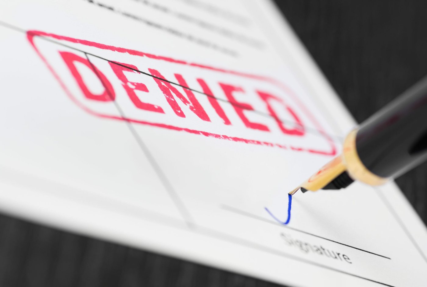 A green card application is denied.