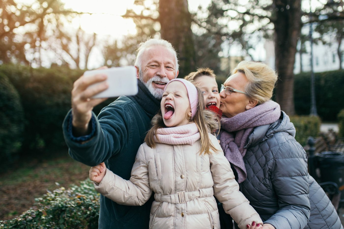 Grandparents taking a selfie with grandkids