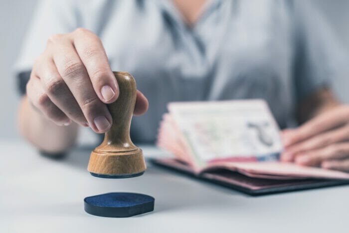 CBP Officer stamps passport