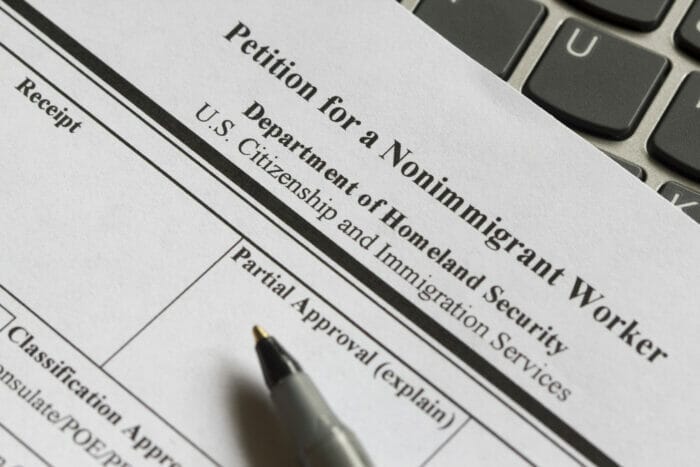Closeup of Form I-129, Petition for a Nonimmigrant Worker, issued by U.S. Citizenship and Immigration Services (USCIS).