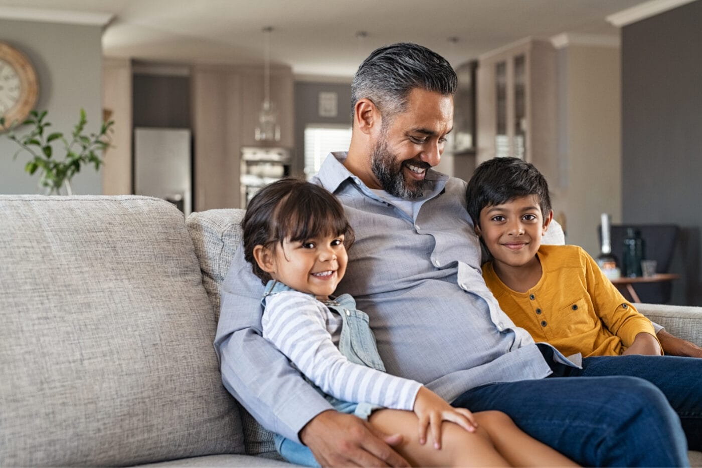 Happy family sitting together