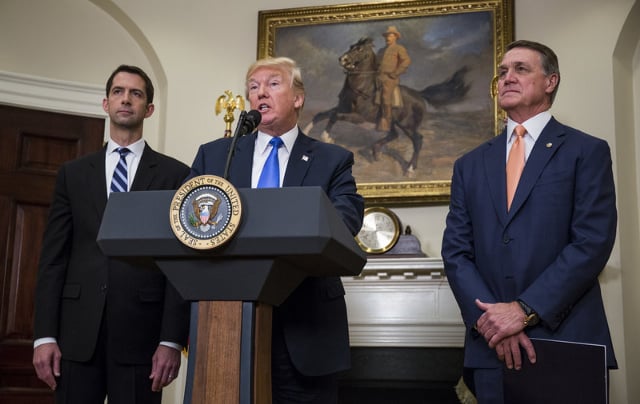Senator Tom Cotton (R-AR), President Donald Trump, and Senator David Perdue (R-GA)